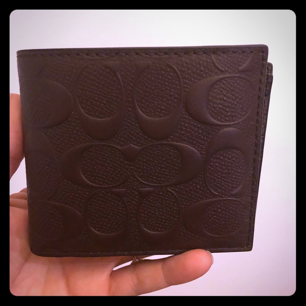 Men’s brand new, brown coach wallet.